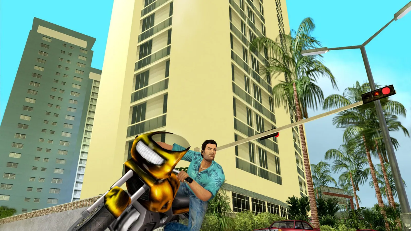 Orijinal GTA Vice City oyununda gün batımında Vice City gökdelenleri ve plajı