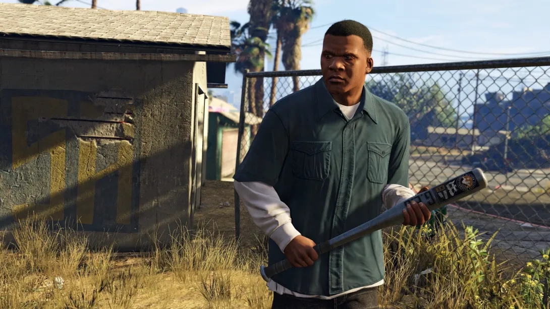 Франклін Клінтон з бейсбольною битою біля паркану в GTA 5