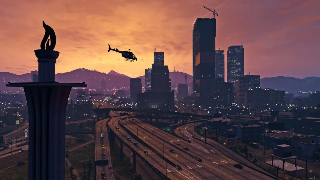 Захід сонця над хмарочосами й автострадами Лос-Сантоса в GTA 5