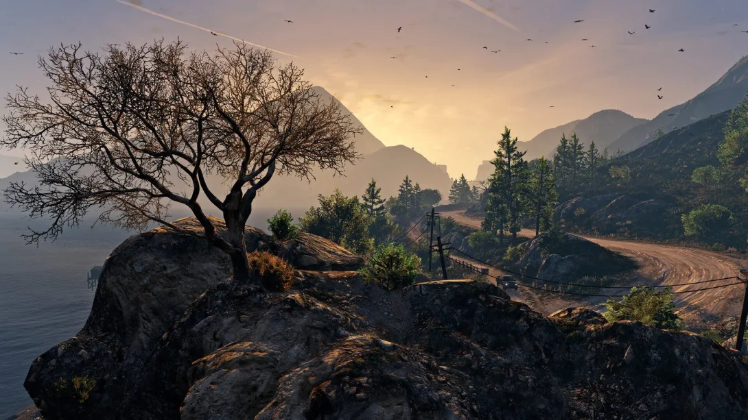 Скеля з деревом над затокою на заході сонця в GTA 5